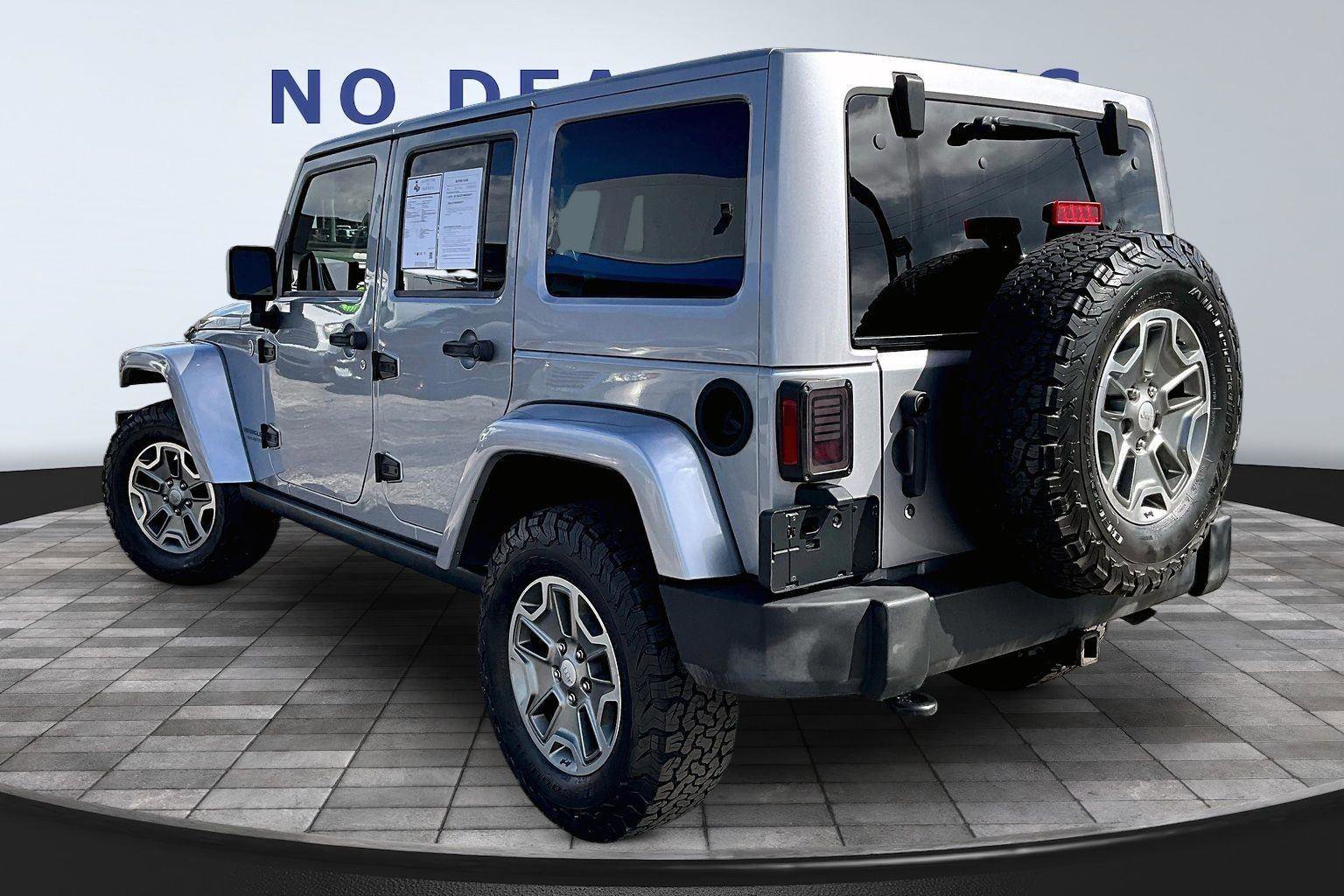 Used 2014 Jeep Wrangler Unlimited Rubicon w/ Dual Top Group AWD/4WD image 4