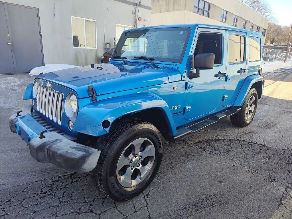 Used 2016 Jeep Wrangler Unlimited Sahara w/ Max Tow Package AWD/4WD image 1