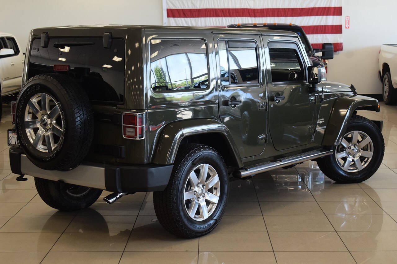 Used 2015 Jeep Wrangler Unlimited Sahara w/ Dual Top Group AWD/4WD image 34
