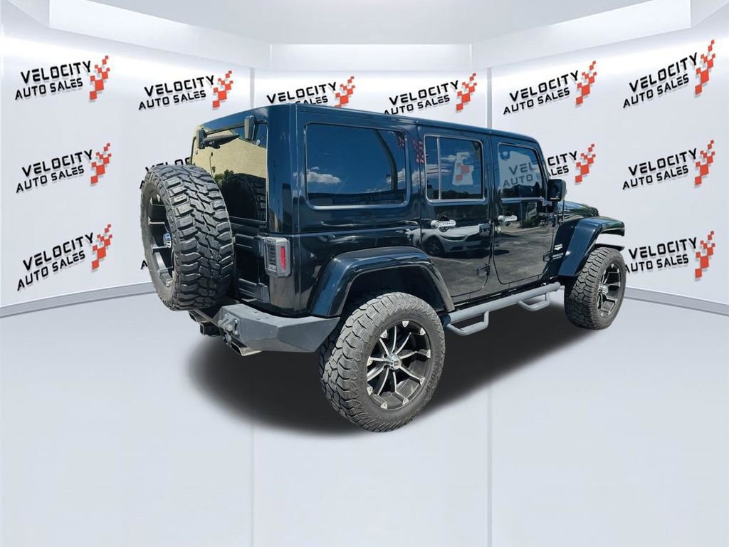 Used 2014 Jeep Wrangler Unlimited Sahara w/ Connectivity Group AWD/4WD image 3