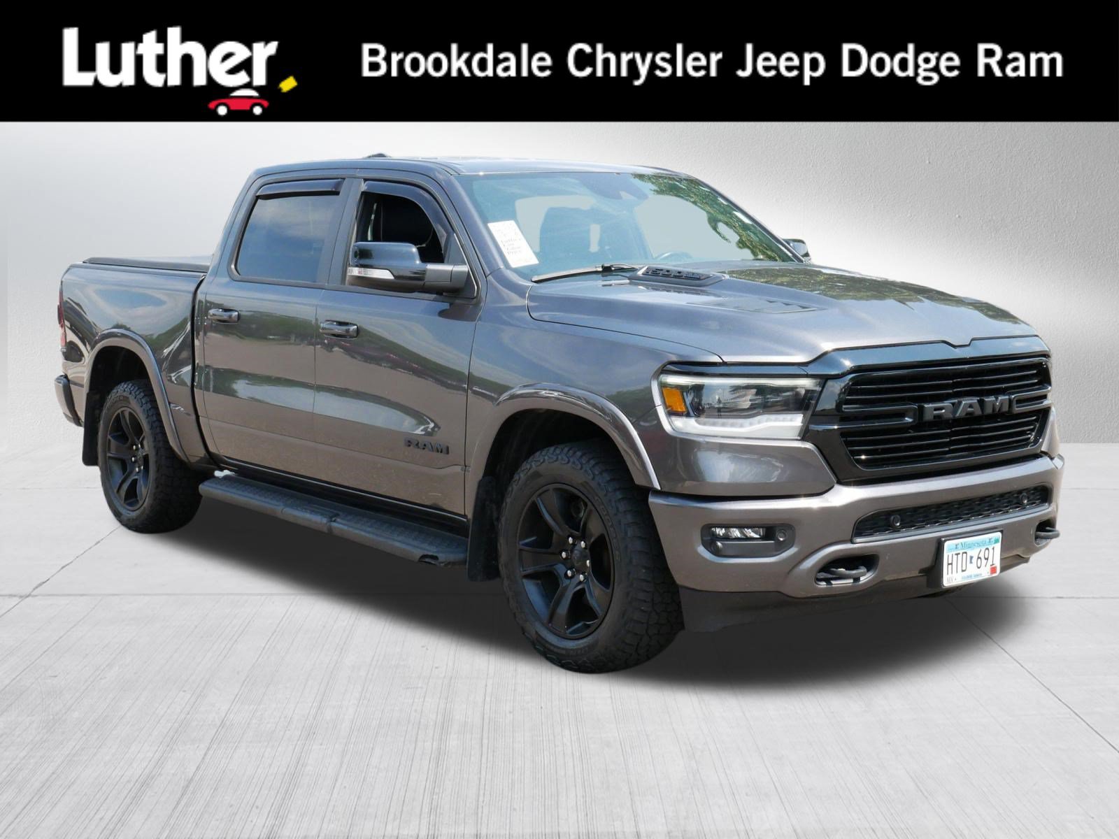 Used 2022 RAM 1500 Laramie AWD/4WD image 1