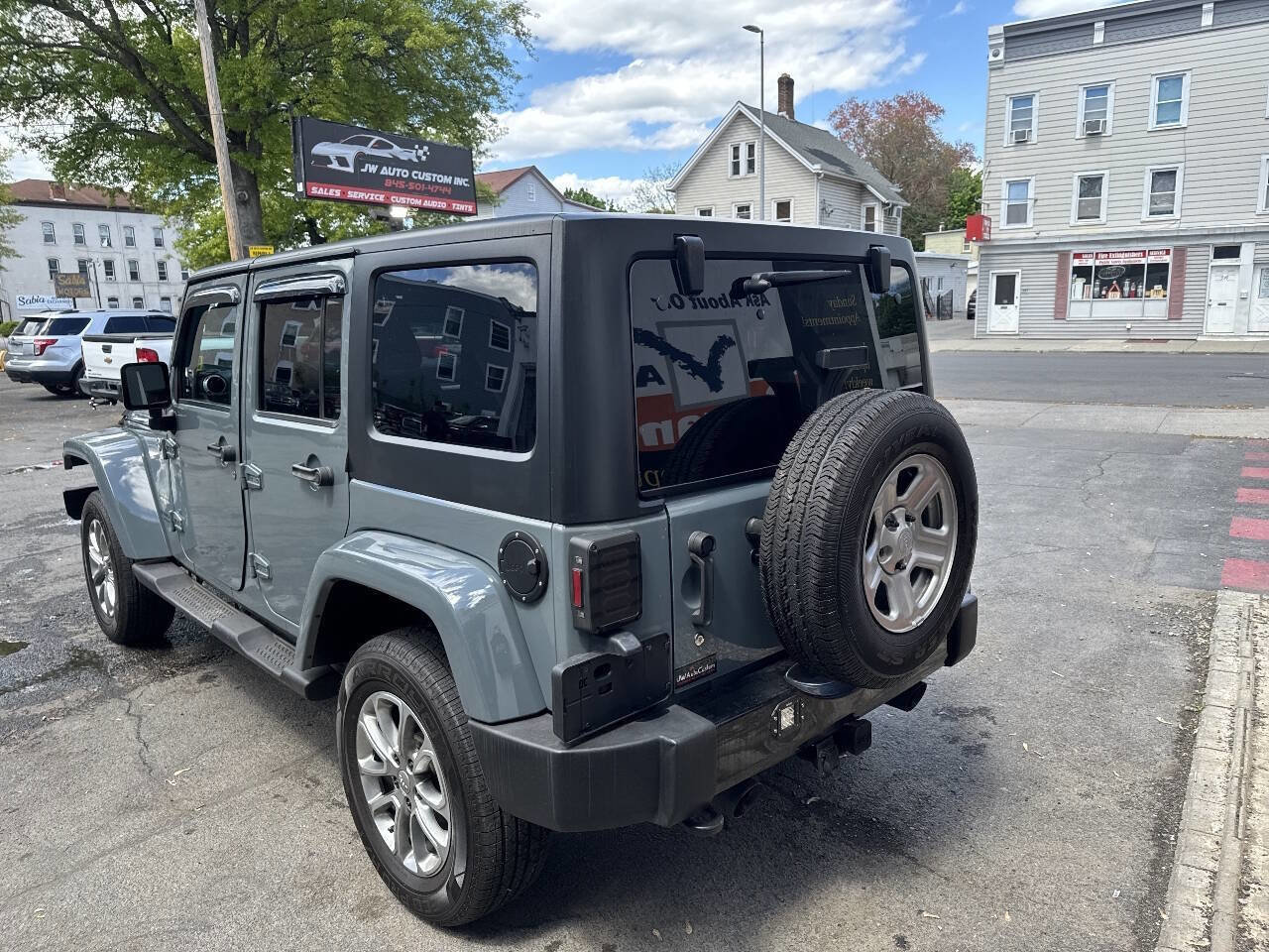 Used 2015 Jeep Wrangler Unlimited Sahara w/ Dual Top Group AWD/4WD image 6