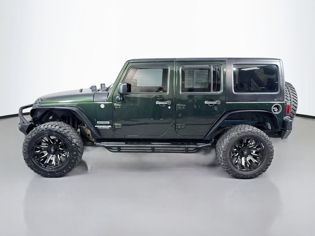 Used 2012 Jeep Wrangler Unlimited Sport w/ Connectivity Group AWD/4WD image 9