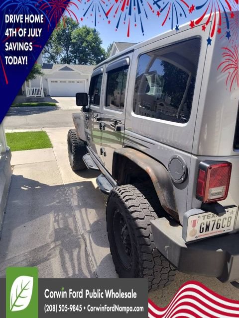 Used 2014 Jeep Wrangler Unlimited Rubicon w/ Dual Top Group AWD/4WD image 3