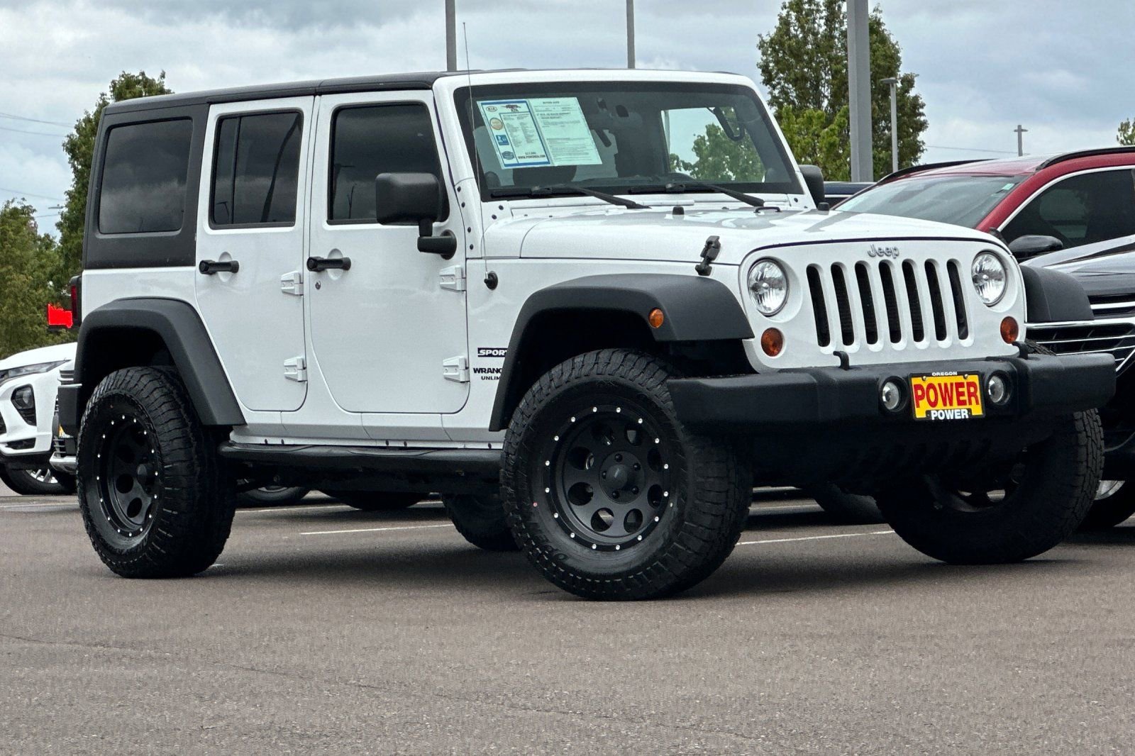 Used 2012 Jeep Wrangler Unlimited Sport AWD/4WD image 2