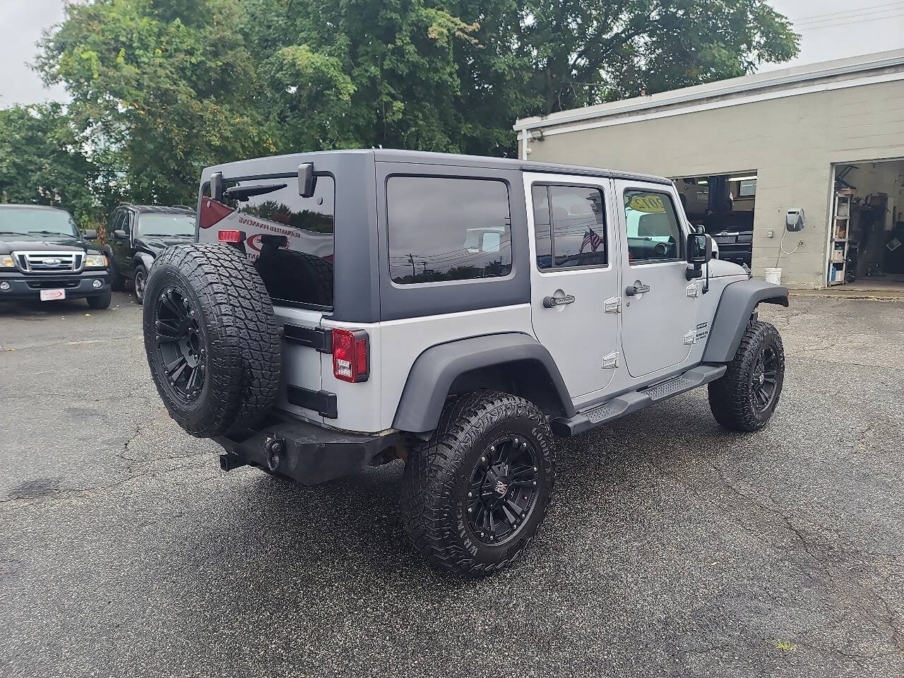 Used 2012 Jeep Wrangler Unlimited Sport w/ Dual Top Group AWD/4WD image 8