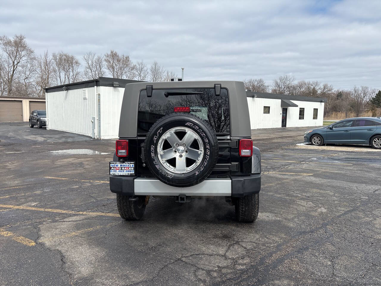 Used 2009 Jeep Wrangler Unlimited Sahara w/ Dual Top Group image 4