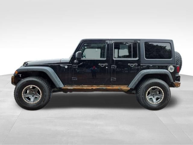 Used 2012 Jeep Wrangler Unlimited Sport image 11