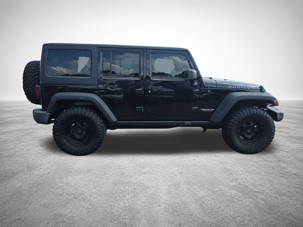 Used 2015 Jeep Wrangler Unlimited Rubicon w/ Dual Top Group AWD/4WD image 9