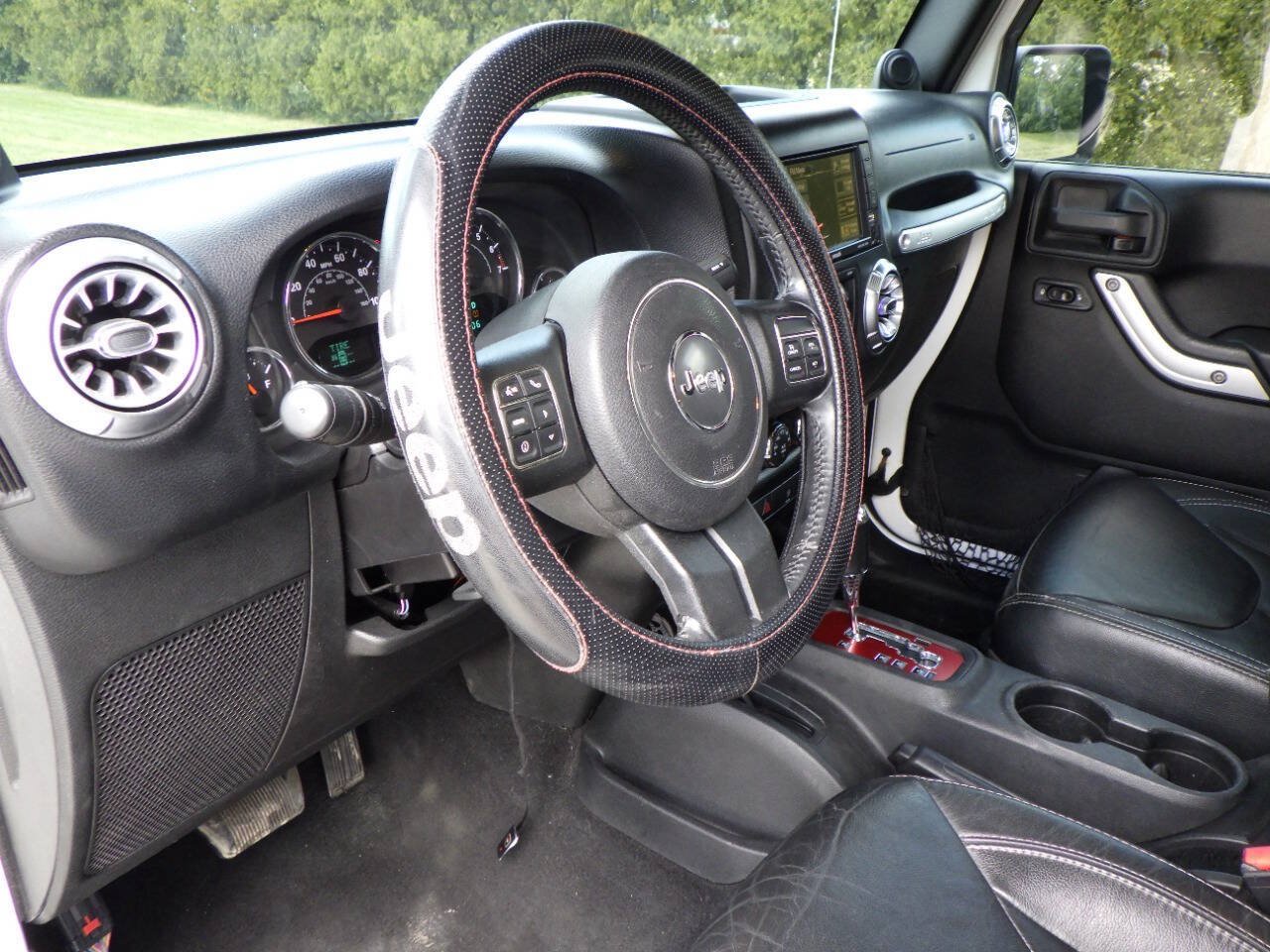 Used 2013 Jeep Wrangler Unlimited Sahara w/ Dual Top Group AWD/4WD image 14