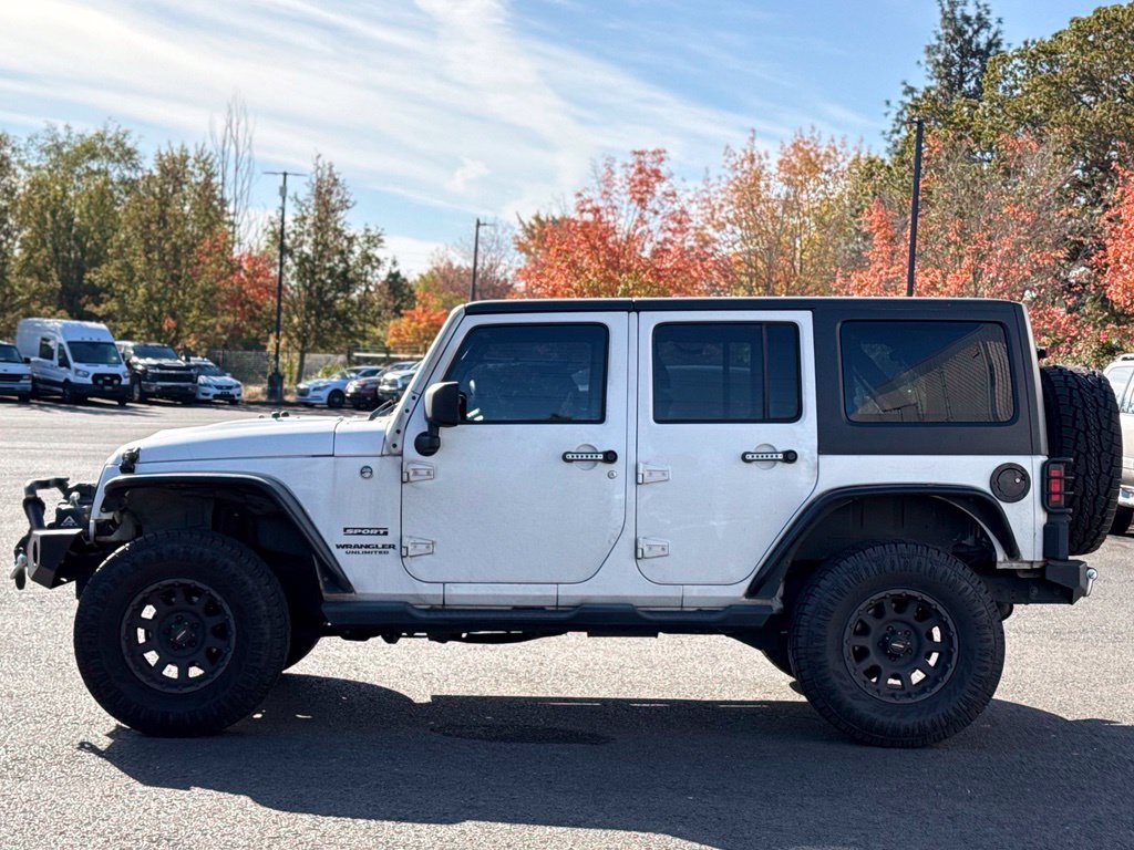 Used 2012 Jeep Wrangler Unlimited Sport AWD/4WD image 2