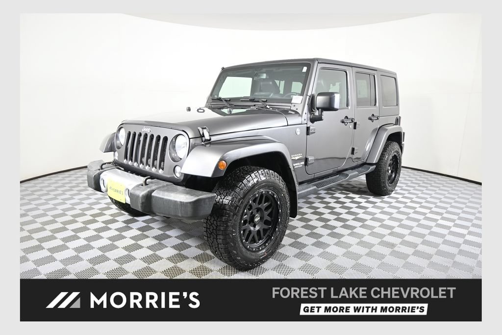 Used 2014 Jeep Wrangler Unlimited Sahara w/ Connectivity Group AWD/4WD image 1