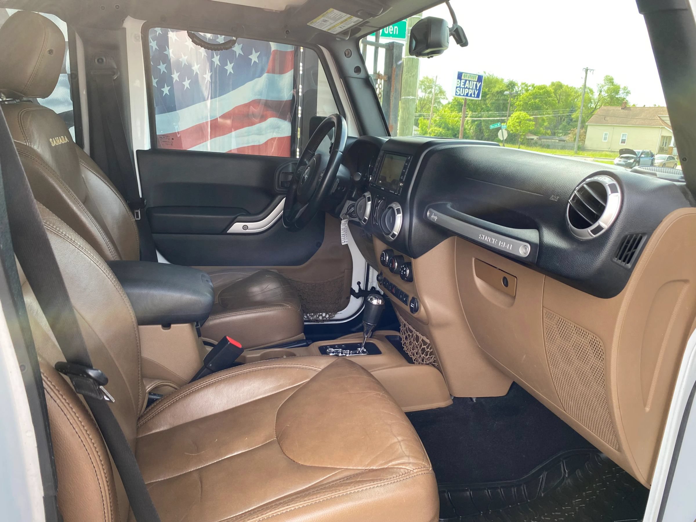 Used 2015 Jeep Wrangler Unlimited Sahara w/ Mopar Chrome Edition Group AWD/4WD image 12