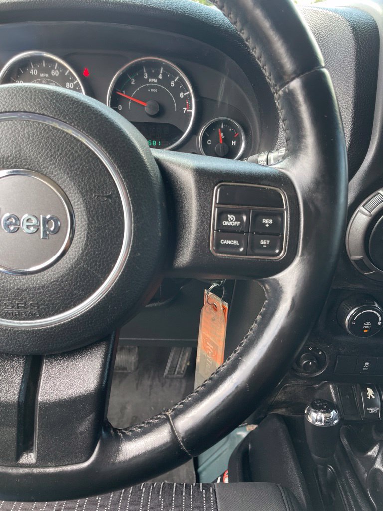 Used 2012 Jeep Wrangler Unlimited Sport AWD/4WD image 14
