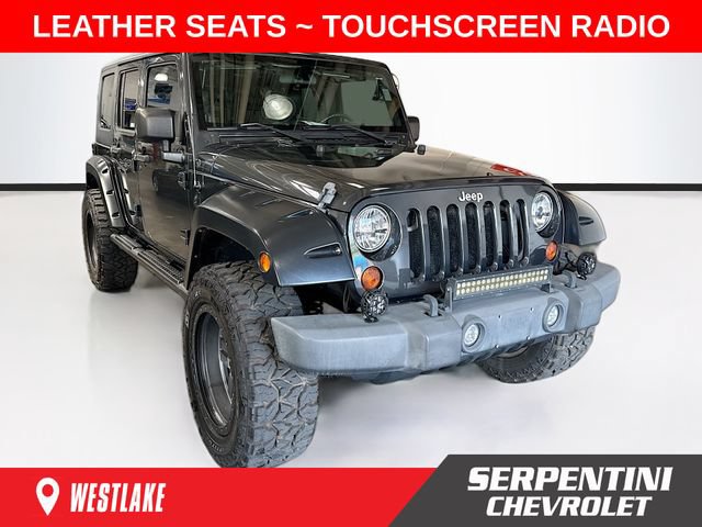 Used 2010 Jeep Wrangler Unlimited Sport AWD/4WD image 1