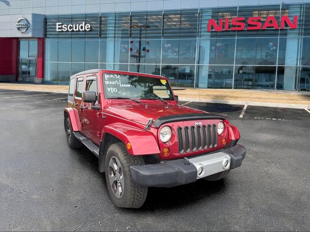Used 2012 Jeep Wrangler Unlimited Sahara w/ Dual Top Group AWD/4WD image 1