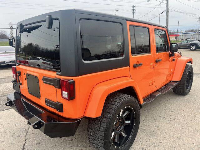 Used 2012 Jeep Wrangler Unlimited Sahara w/ Dual Top Group image 7