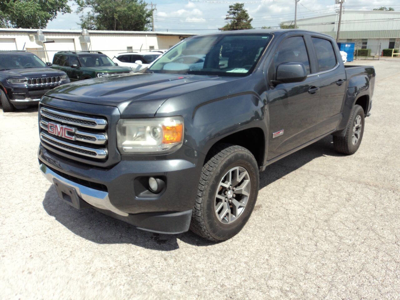 Used 2016 GMC Canyon SLE w/ All Terrain Adventure Package AWD/4WD image 1
