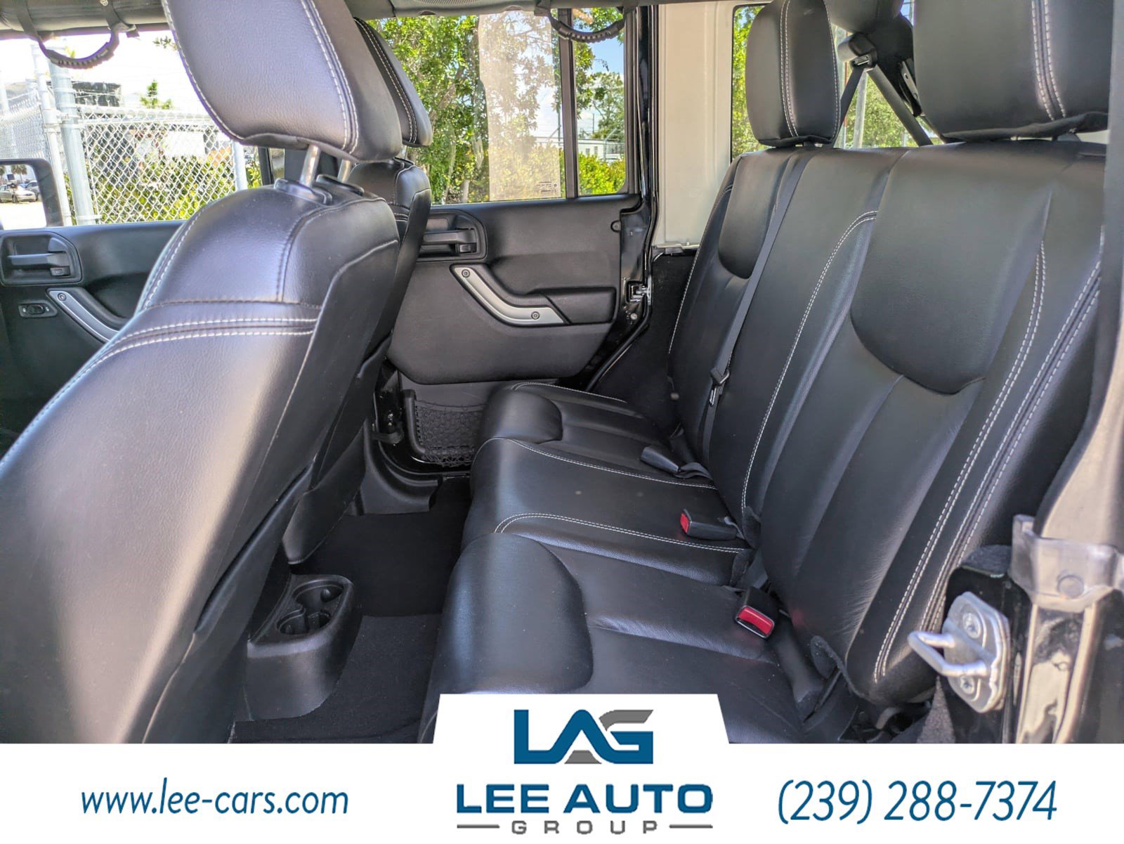 Used 2014 Jeep Wrangler Unlimited Sahara w/ Dual Top Group AWD/4WD image 11
