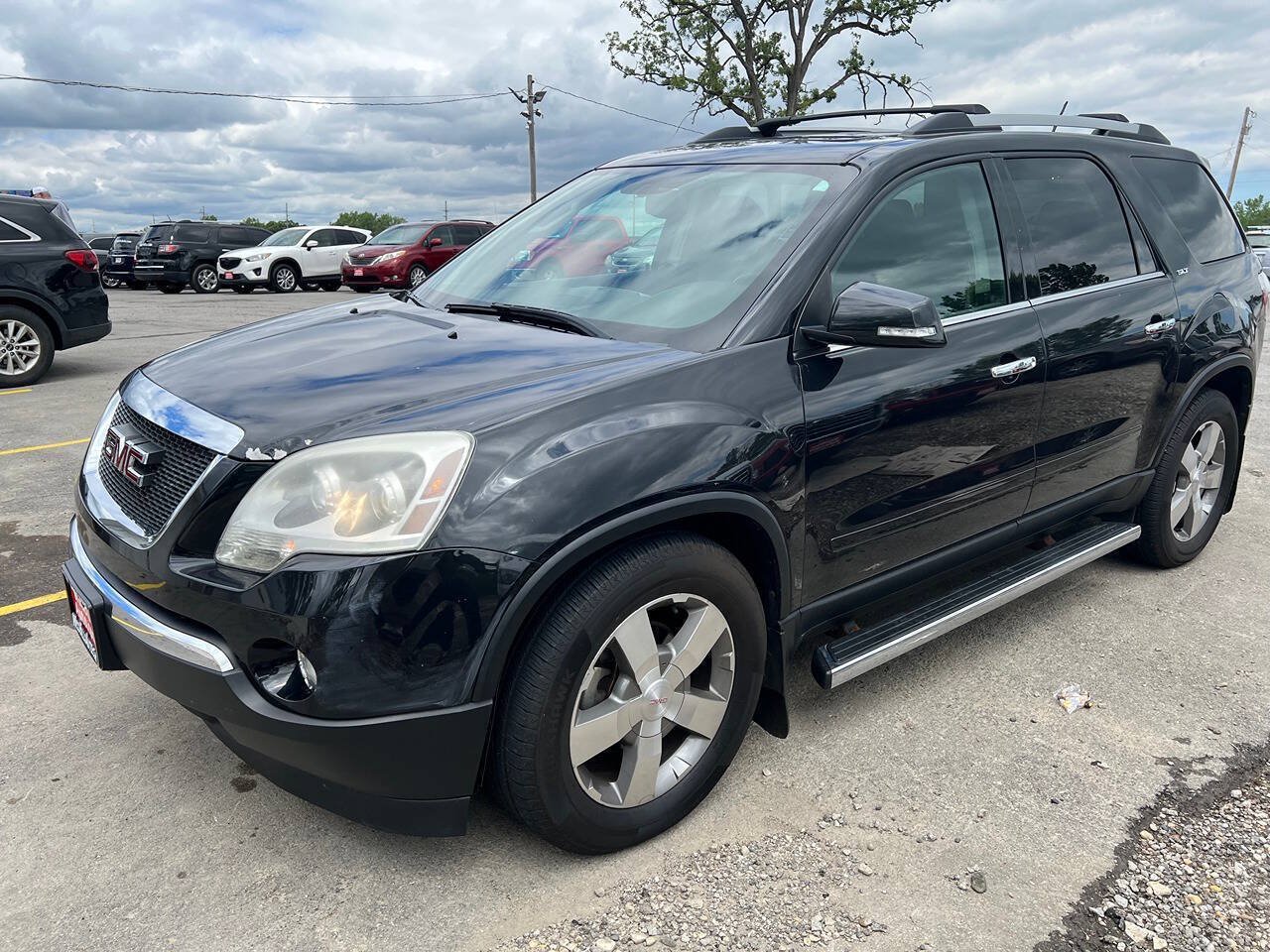 Used 2012 GMC Acadia SLT w/ LPO, 'HIT The Road' Package AWD/4WD image 1