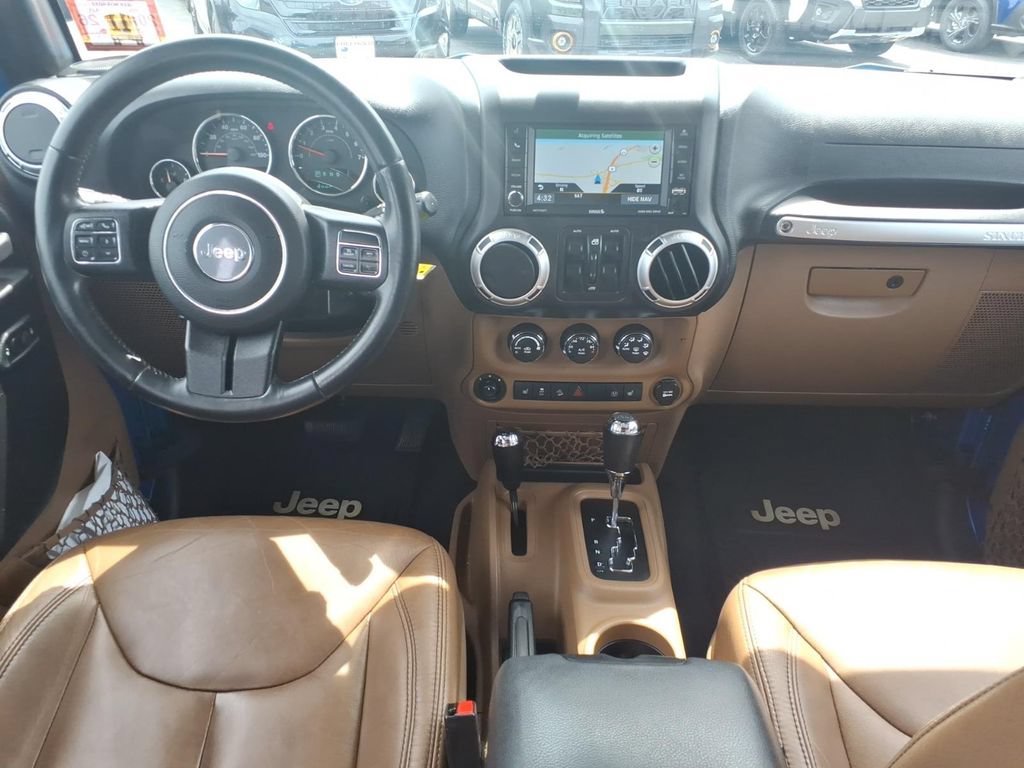 Used 2015 Jeep Wrangler Unlimited Sahara w/ Dual Top Group AWD/4WD image 11