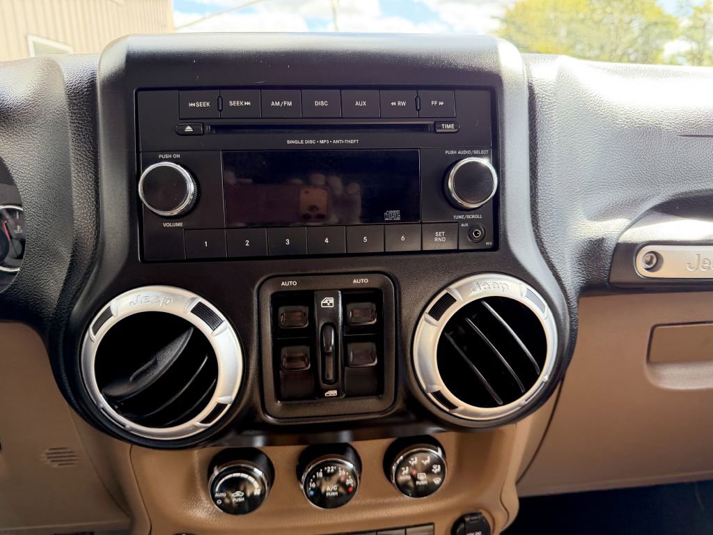 Used 2012 Jeep Wrangler Unlimited Sahara w/ Dual Top Group image 16