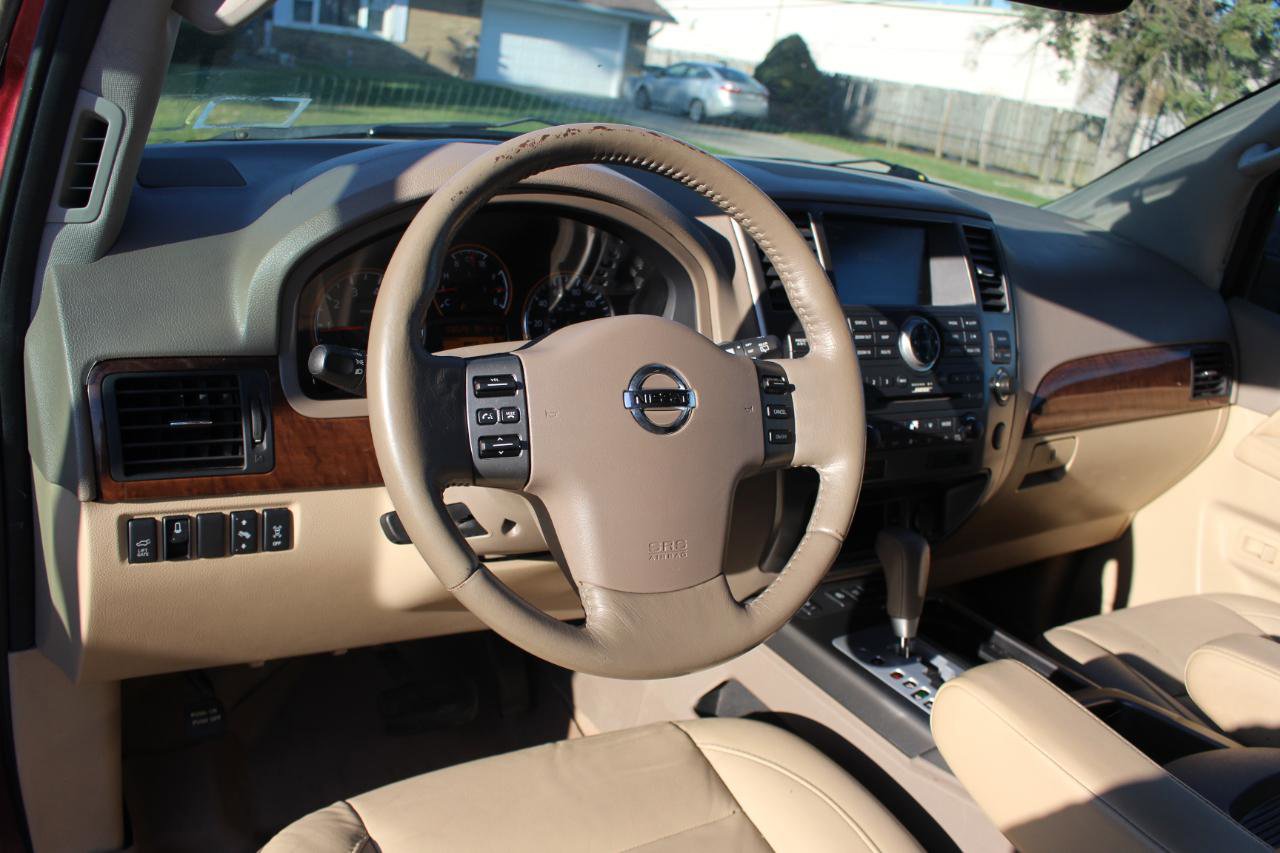 Used 2011 Nissan Armada Platinum w/ 2nd Row Captain Seat Pkg image 14