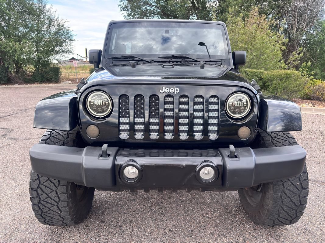 Used 2013 Jeep Wrangler Unlimited Sahara w/ Dual Top Group AWD/4WD image 2