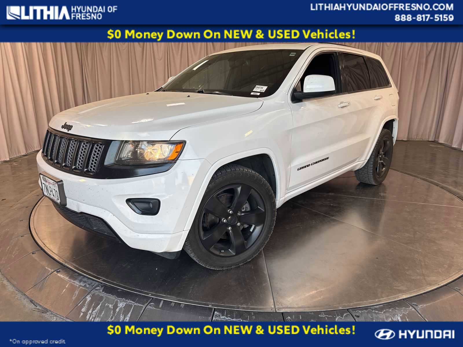 Used 2015 Jeep Grand Cherokee Altitude RWD image 1