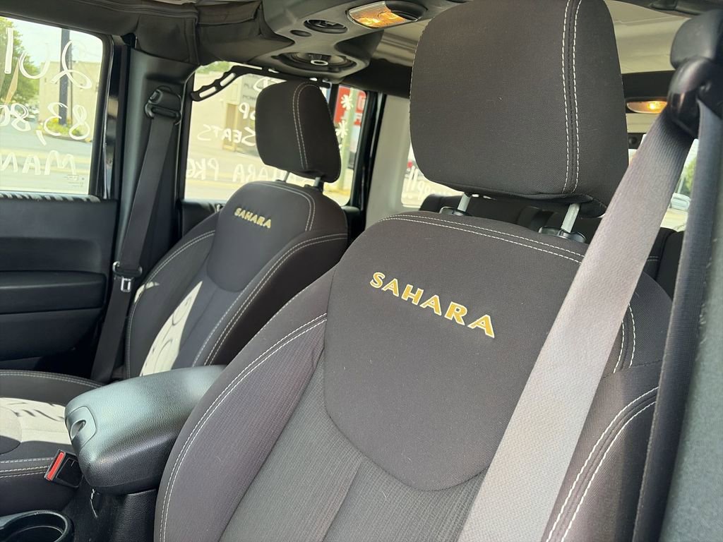 Used 2014 Jeep Wrangler Unlimited Sahara w/ Dual Top Group AWD/4WD image 11