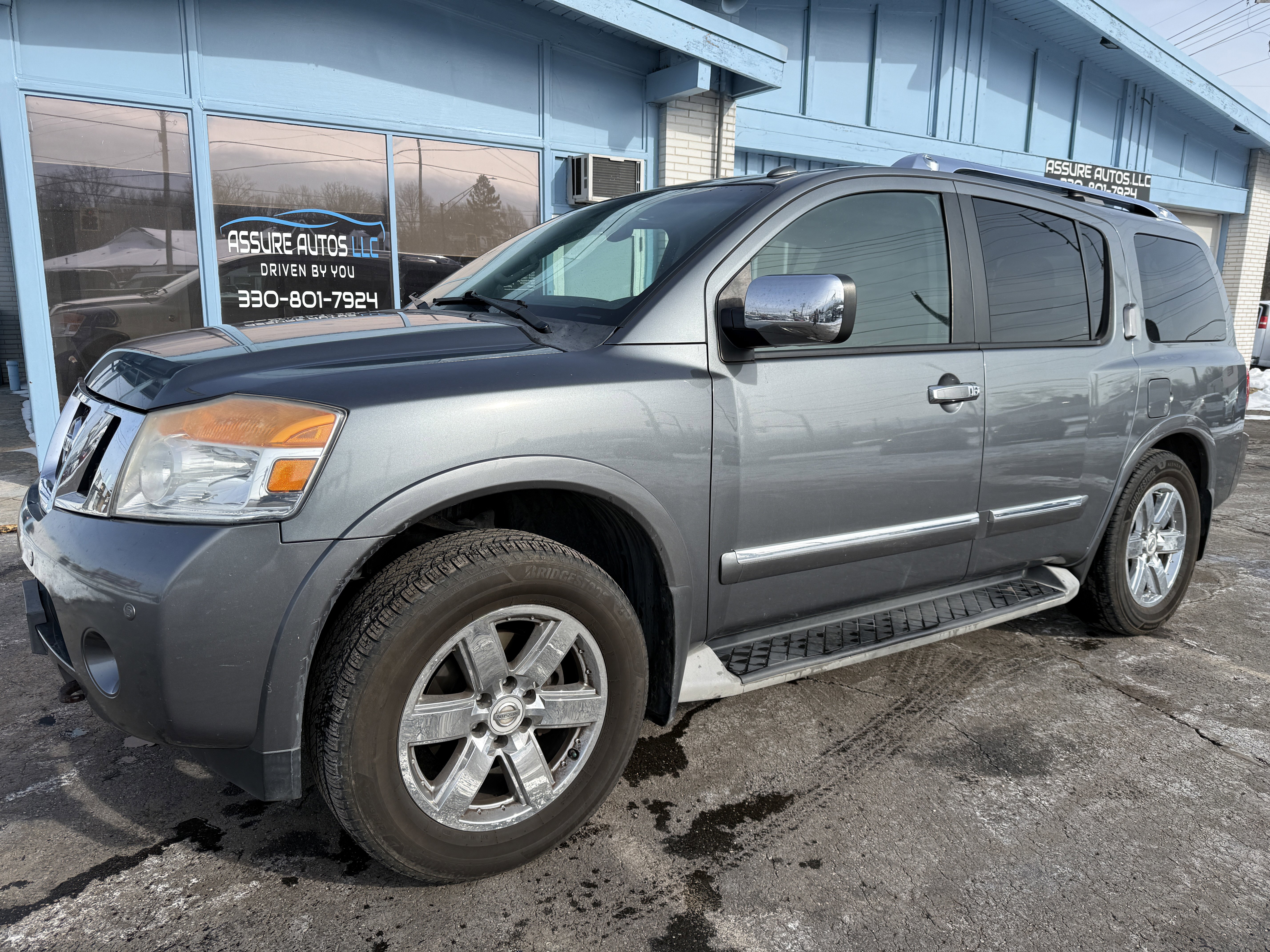 Used 2014 Nissan Armada Platinum w/ 2nd Row Captain Seat Package image 1