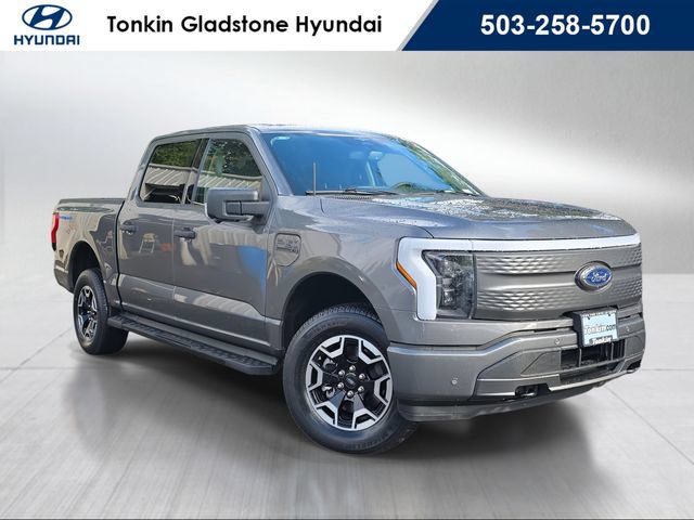 Used 2023 Ford F150 Lightning XLT AWD/4WD image 1