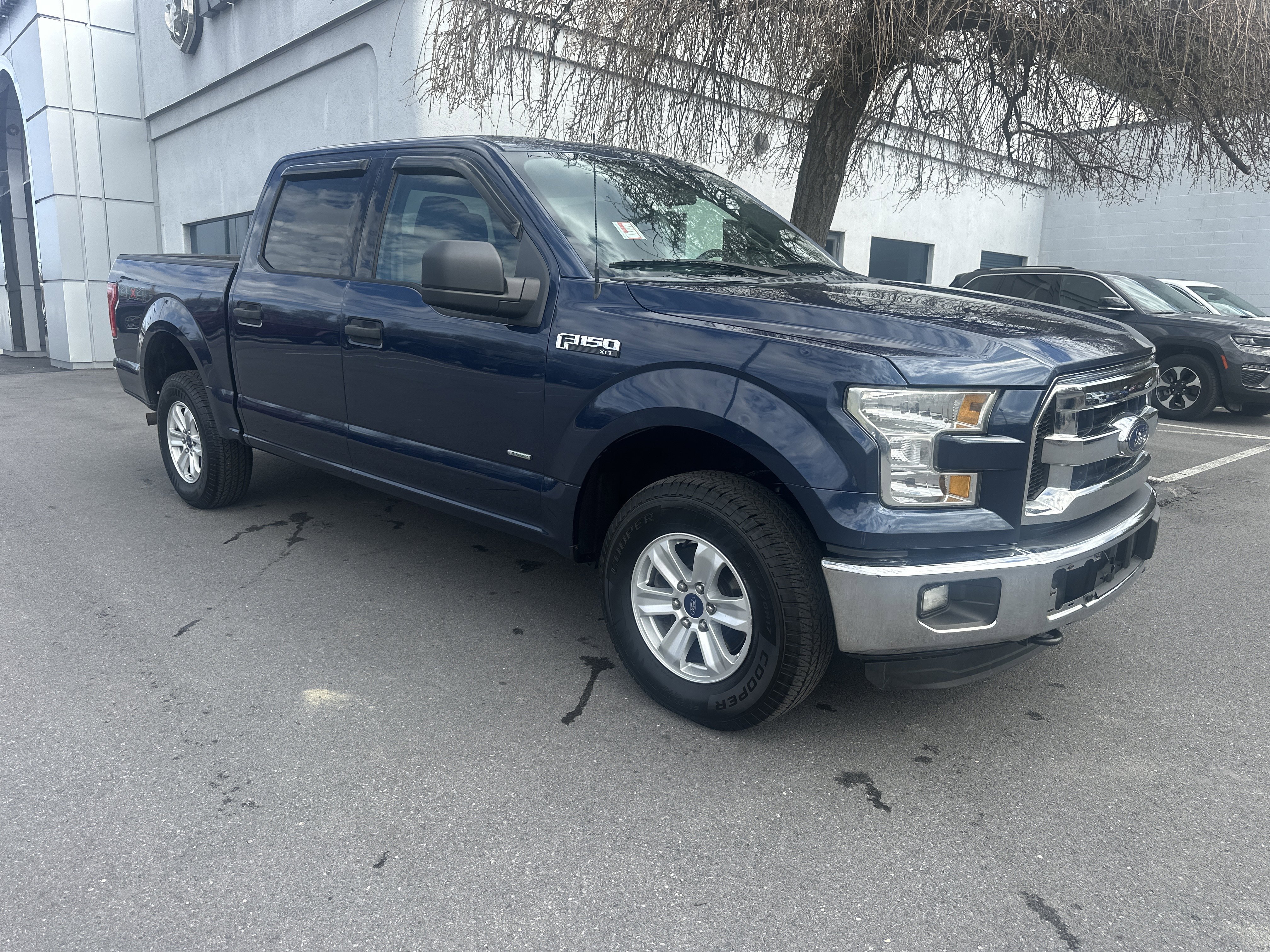 Used 2015 Ford F150 XLT AWD/4WD image 1