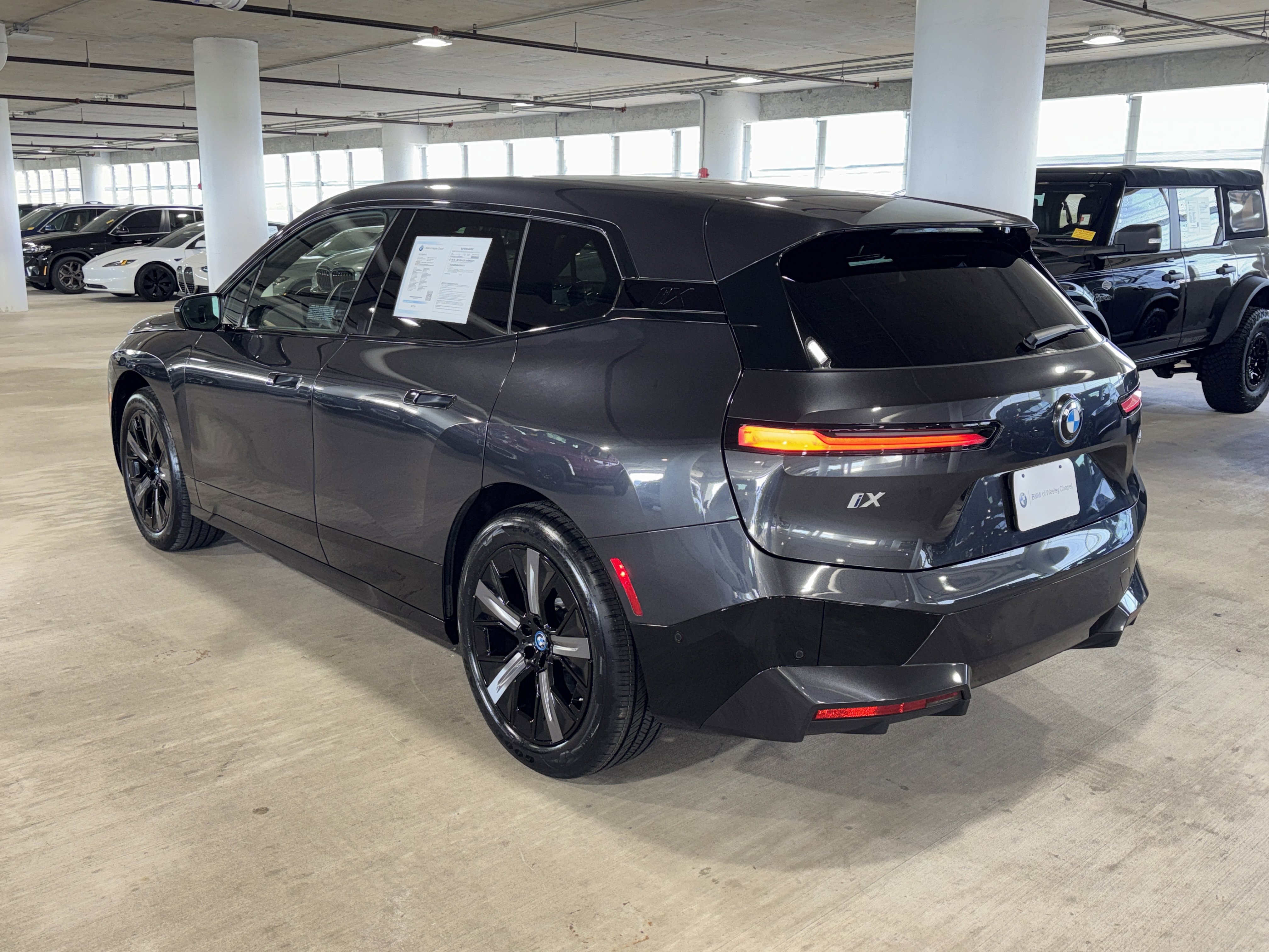 Used 2025 BMW iX xDrive50 w/ Sport Package AWD/4WD image 6