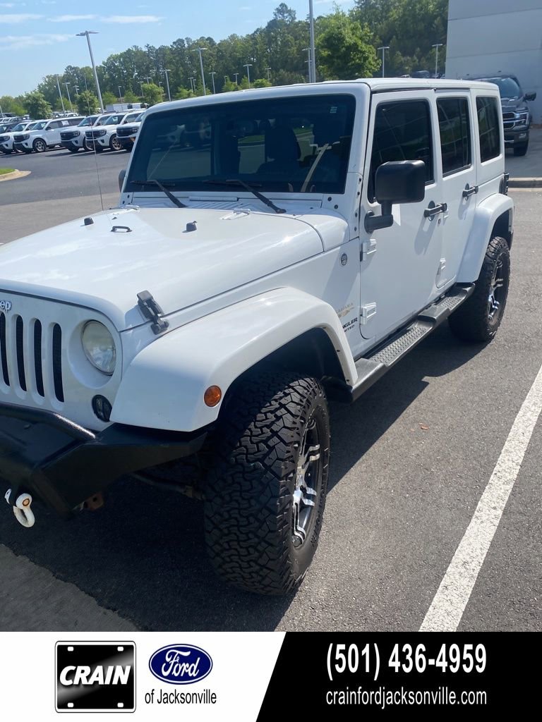 Used 2014 Jeep Wrangler Unlimited Sahara w/ Trailer Tow Group AWD/4WD image 1