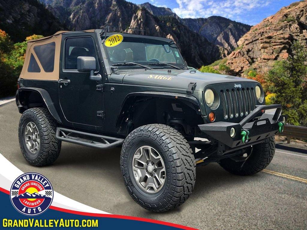 Used 2012 Jeep Wrangler Sahara w/ Dual Top Group AWD/4WD image 1
