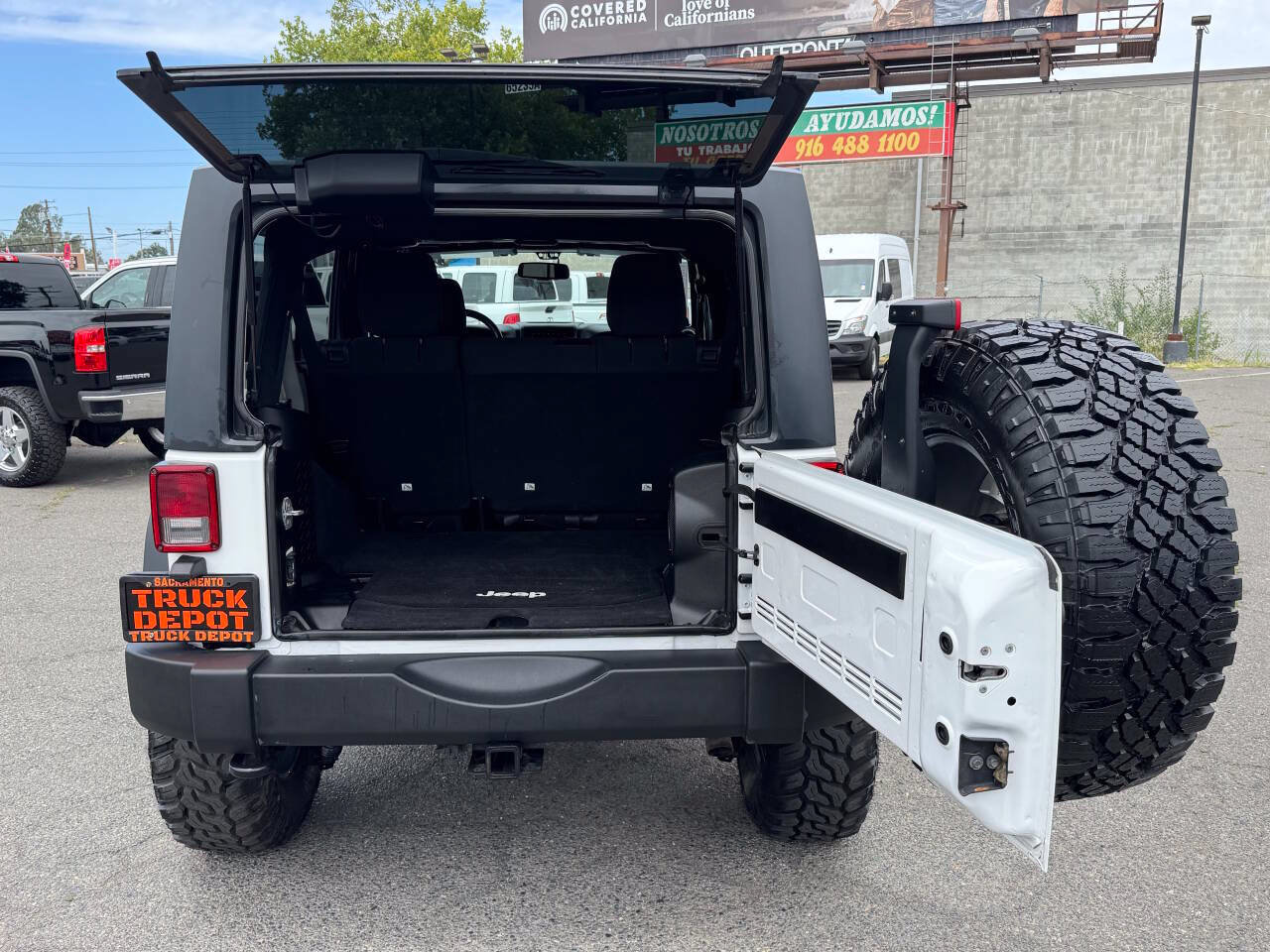 Used 2013 Jeep Wrangler Unlimited Sport AWD/4WD image 9