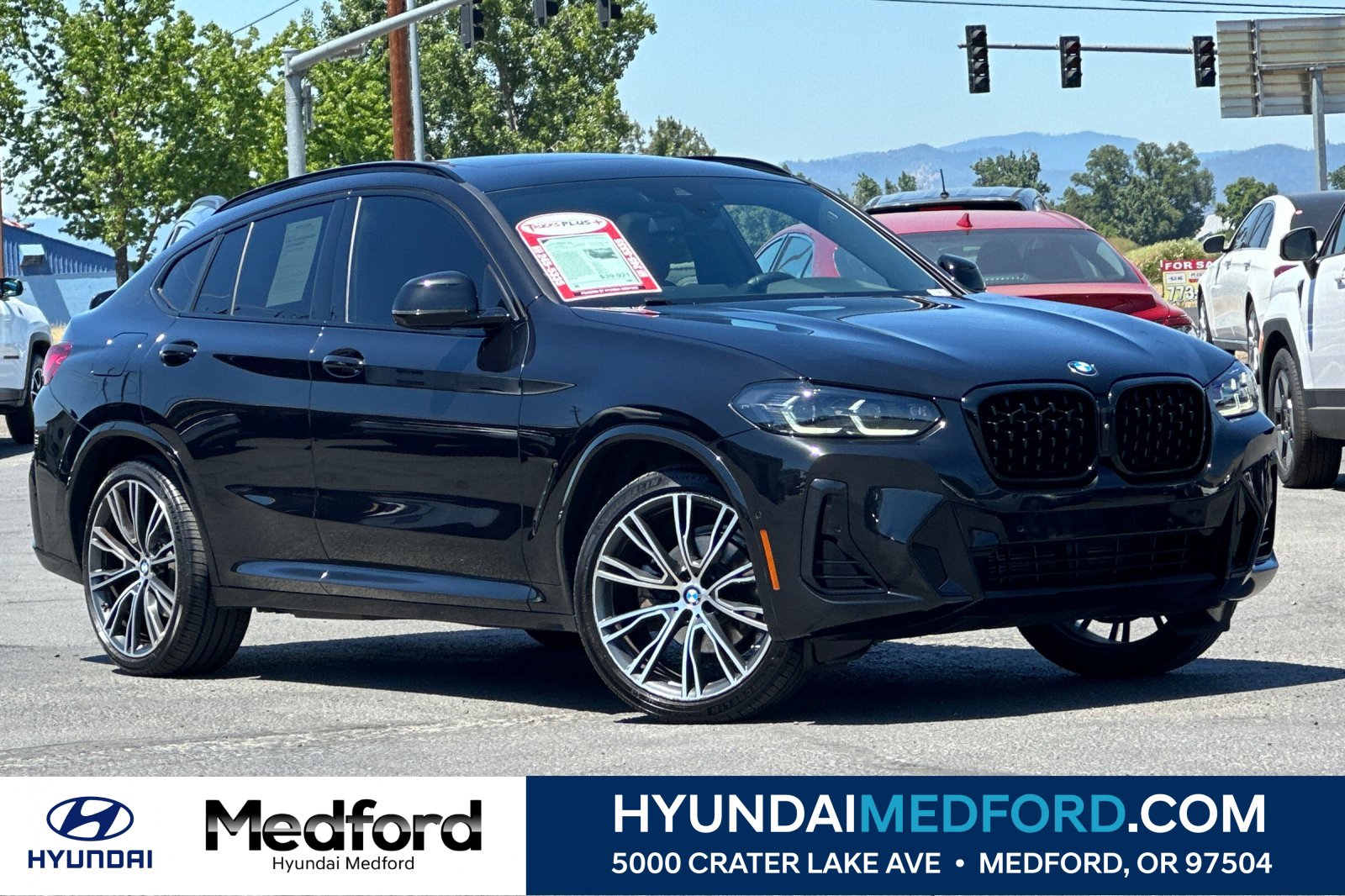 Used 2023 BMW X4 xDrive30i w/ M Sport Package AWD/4WD image 1
