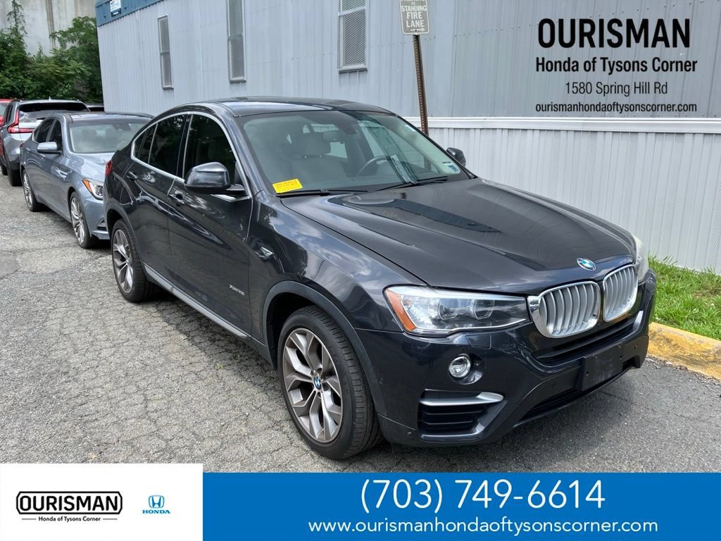 Used 2015 BMW X4 xDrive28i AWD/4WD image 1