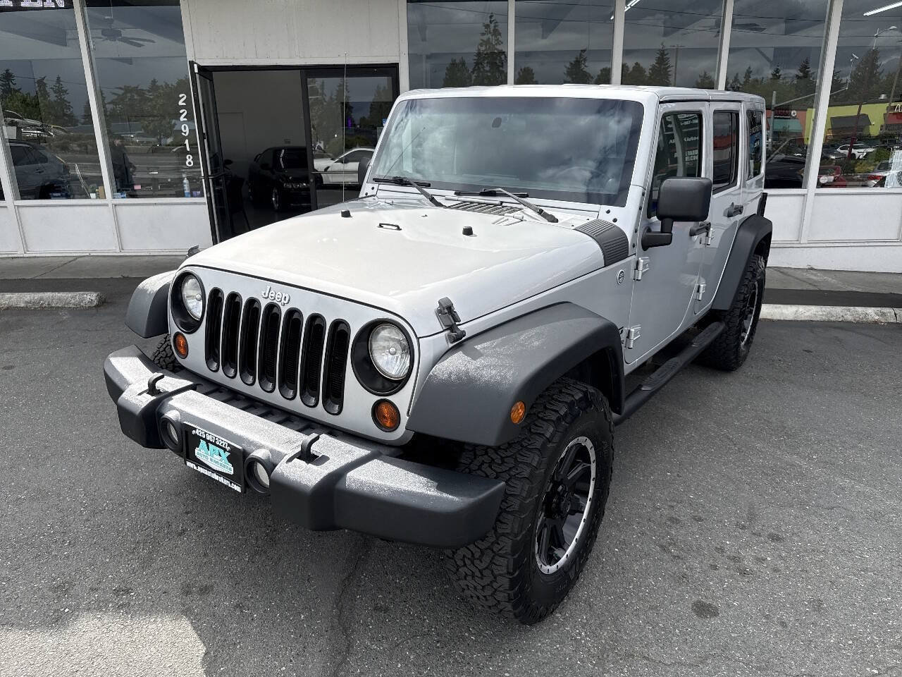 Used 2011 Jeep Wrangler Unlimited Sport AWD/4WD image 1