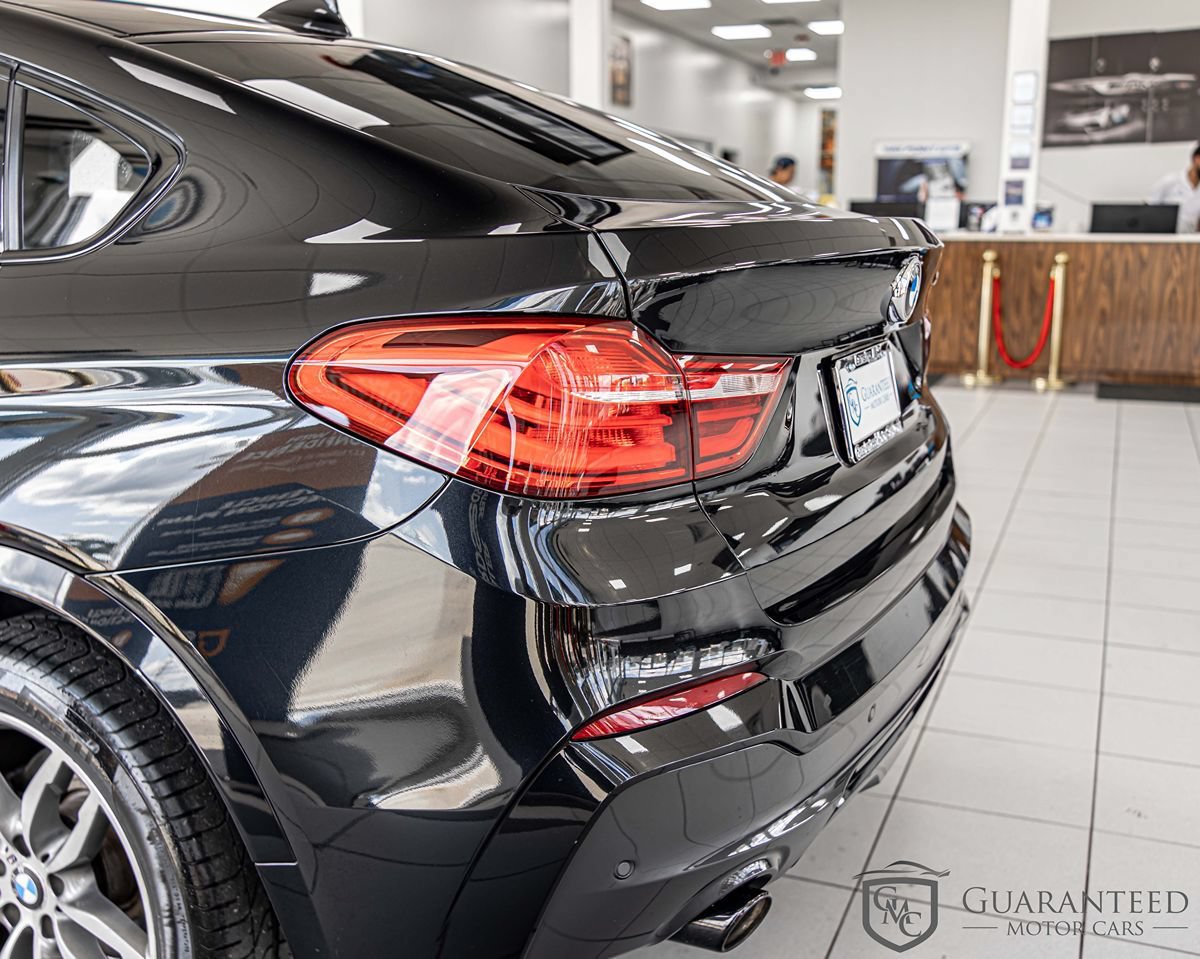 Used 2017 BMW X4 M40i w/ Technology Package AWD/4WD image 12