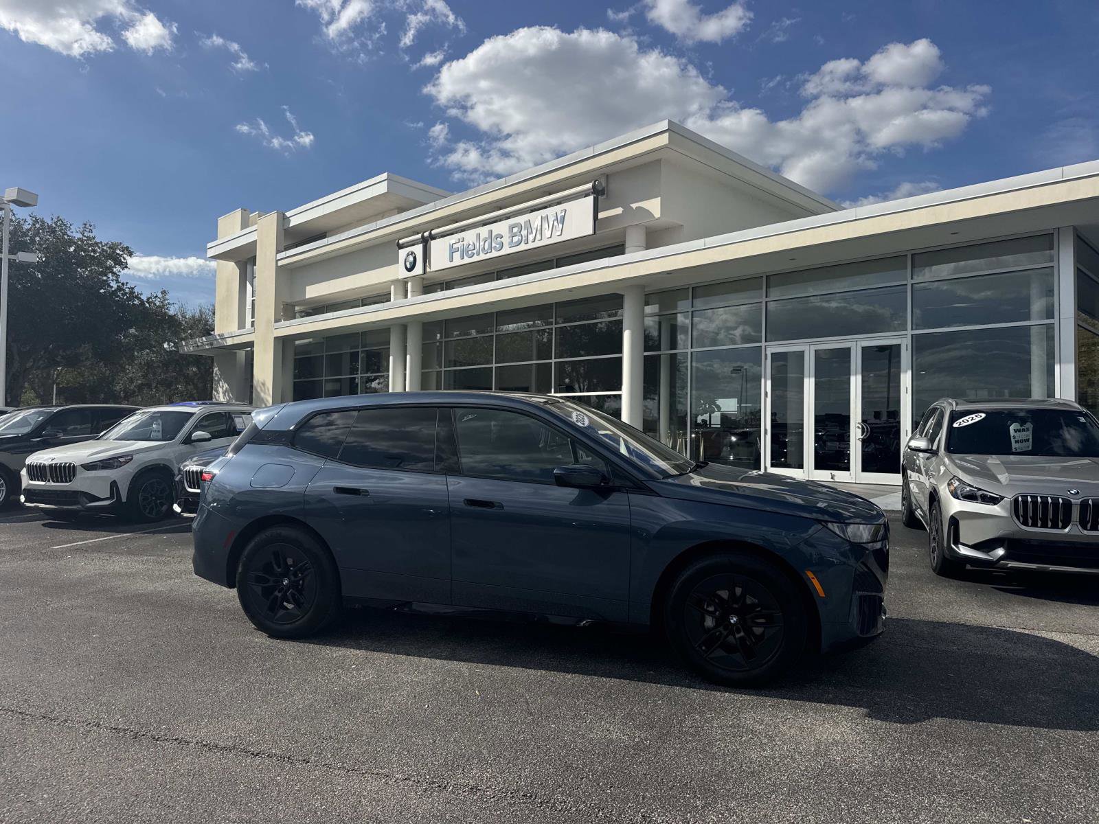 Used 2026 BMW iX xDrive45 w/ Premium Package image 1