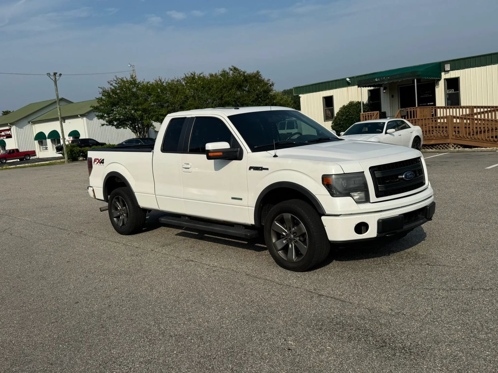Used 2014 Ford F150 FX4 w/ Equipment Group 402A Luxury AWD/4WD image 2
