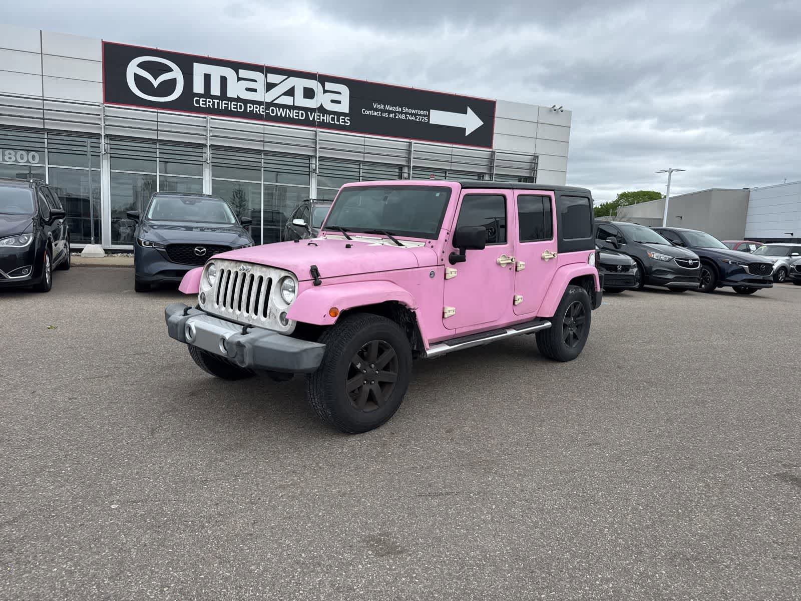 Used 2015 Jeep Wrangler Unlimited Sahara w/ Mopar Chrome Edition Group AWD/4WD video 1