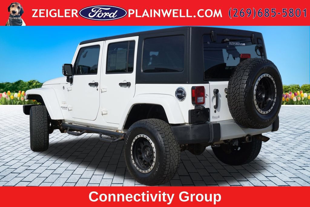 Used 2012 Jeep Wrangler Unlimited Sahara w/ Dual Top Group AWD/4WD image 3