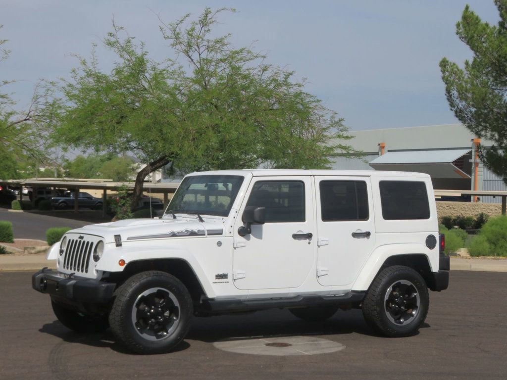 Used 2014 Jeep Wrangler Unlimited Sahara AWD/4WD image 1