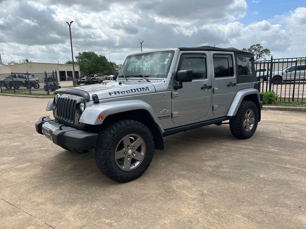 Used 2013 Jeep Wrangler Unlimited Sport image 1