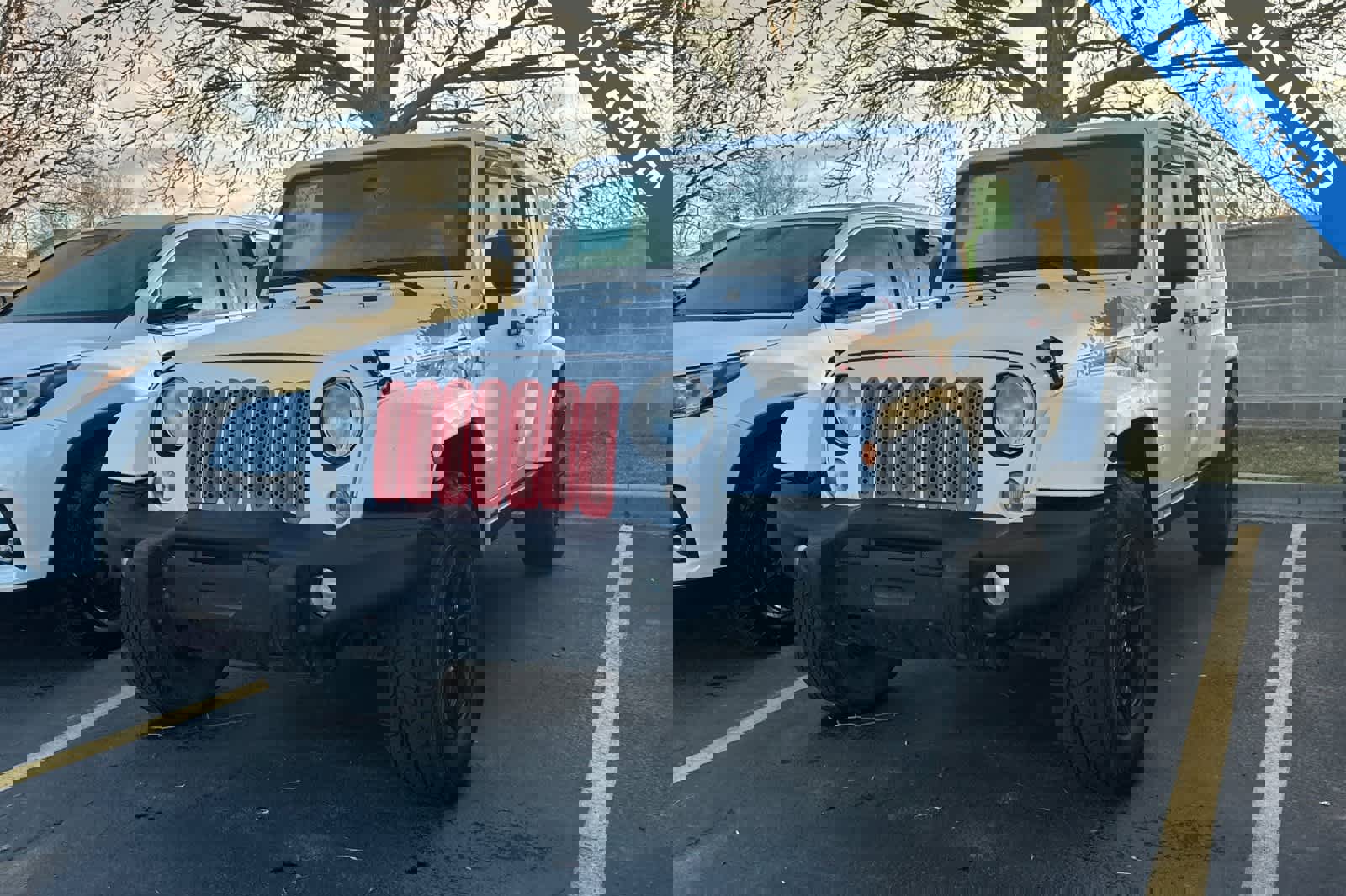 Used 2016 Jeep Wrangler Unlimited Sahara image 1