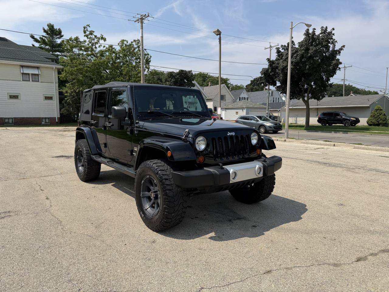Used 2012 Jeep Wrangler Unlimited Sahara w/ Dual Top Group AWD/4WD image 1