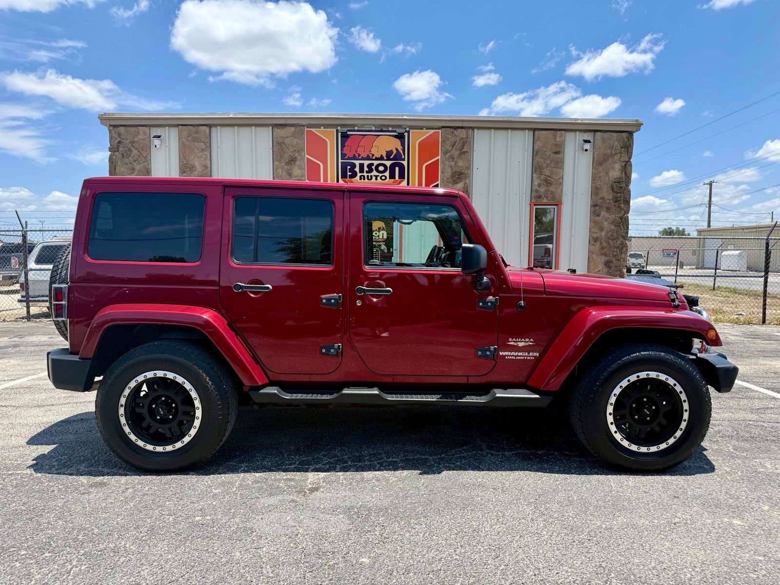 Used 2012 Jeep Wrangler Unlimited Sahara w/ Dual Top Group AWD/4WD image 2